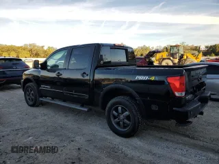 2015 Nissan Titan SL with VIN 1N6BA0EC1FN508172, listed as a Copart auction lot 86518404 with 102,062 mi miles and Salvage Title. Bid and sale history available at carsss.com. Image 2.
