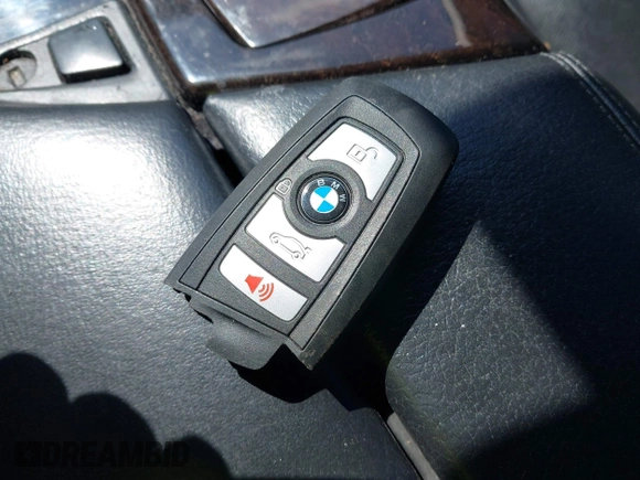 2012 BMW 5 Series 528i xDrive with VIN WBAXH5C58CDW03798, listed as a IAAI auction lot 42011933 with 115,508 mi miles and . Bid and sale history available at DreamBid. Image 11.