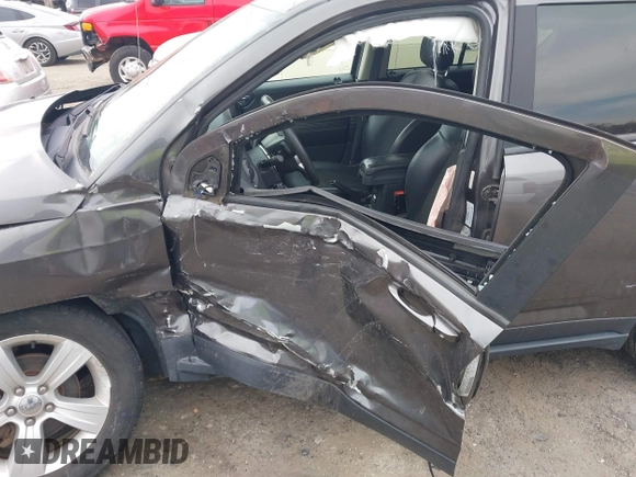 2016 Jeep Compass Latitude with VIN 1C4NJDEB4GD687300, listed as a IAAI auction lot 41800186 with 169,374 mi miles. Bid and sale history available at carsss.com. Image 17.