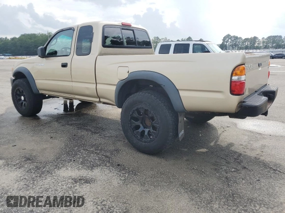 2002 Toyota Tacoma with VIN 5TEWM72N12Z093226, listed as a Copart auction lot 61019955 with 103,657 mi miles and Clean title. Bid and sale history available at DreamBid. Image 2.