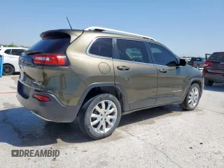 2015 Jeep Cherokee Limited with VIN 1C4PJLDB3FW572761, listed as a Copart auction lot 52529045 with 101,302 mi miles and Salvage Title. Bid and sale history available at DreamBid. Image 3.