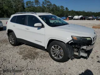 2019 Jeep Cherokee Latitude Plus with VIN 1C4PJLLB9KD204771, listed as a Copart auction lot 52573325 with 123,150 mi miles and Salvage Title. Bid and sale history available at carsss.com. Image 4.
