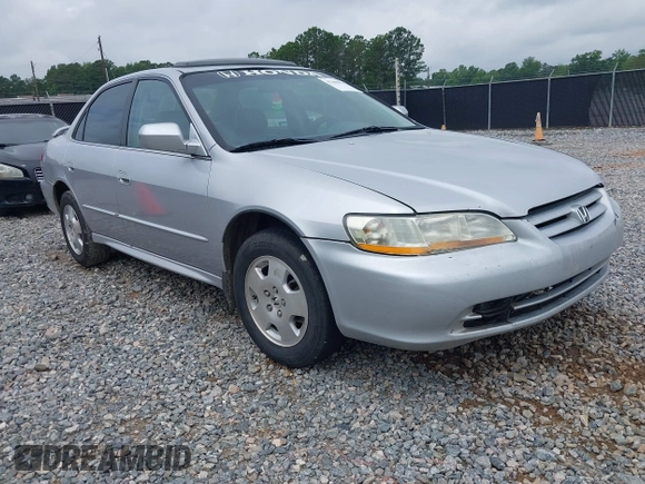 2002 Honda Accord EX z VIN 1HGCG16562A084499, wystawiony jako IAAI lot #42446830 z przebiegiem 241 615 mil mil oraz . Historia ofert i sprzedaży dostępna na DreamBid. Obrazek 1.