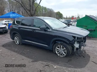 2019 Hyundai Santa Fe SE with VIN 5NMS2CAD3KH092150, listed as a IAAI auction lot 41902766 with 46,595 mi miles and . Bid and sale history available at DreamBid. Image 13.