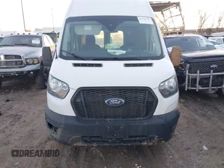 2023 Ford Transit Cargo z VIN 1FTBR3X89PKA82787, wystawiony jako IAAI lot #41330722 z przebiegiem 76 536 mil mil oraz . Historia ofert i sprzedaży dostępna na DreamBid. Obrazek 12.