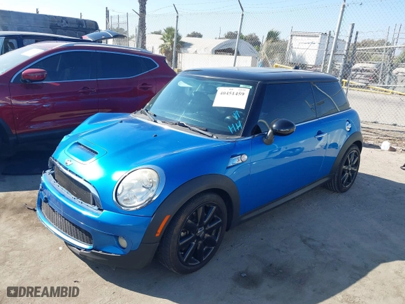 2010 MINI Cooper Hardtop S with VIN WMWMF7C51ATZ71215, listed as a IAAI auction lot 40451459 with 104,402 mi miles. Bid and sale history available at carsss.com. Image 16.