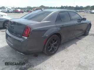 2021 Chrysler 300 with VIN 2C3CCABG5MH550210, listed as a IAAI auction lot 37195041 with 41,000 mi miles. Bid and sale history available at carsss.com. Image 4.