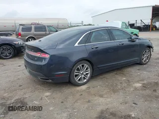 2014 Lincoln MKZ z VIN 3LN6L2GK1ER829764, wystawiony jako IAAI lot #42075349 z przebiegiem 229 251 mil mil oraz . Historia ofert i sprzedaży dostępna na DreamBid. Obrazek 4.