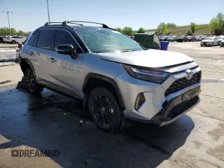 2023 Toyota RAV4 Hybrid XSE with VIN JTME6RFV3PD543597, listed as a Copart auction lot 56715555 with 33,092 mi miles and Salvage title. Bid and sale history available at DreamBid. Image 4.