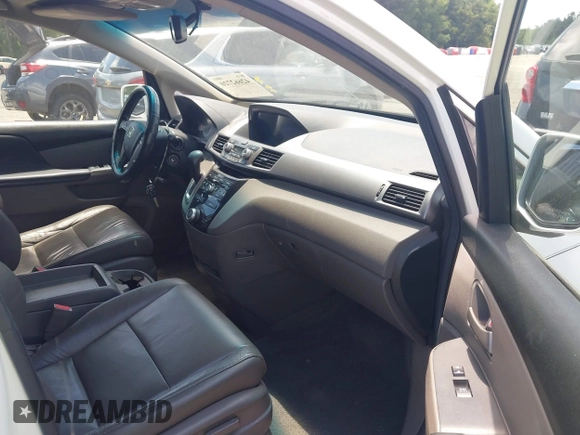 2011 Honda Odyssey EX-L with VIN 5FNRL5H6XBB002461, listed as a IAAI auction lot 42662720 with 145,672 mi miles and . Bid and sale history available at DreamBid. Image 5.