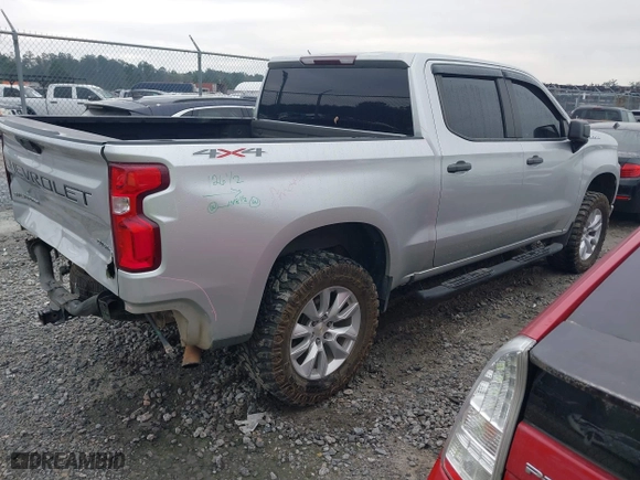 2021 Chevrolet Silverado 1500 Custom with VIN 3GCPYBEK5MG162138, listed as a IAAI auction lot 40882386 with 104,537 mi miles. Bid and sale history available at carsss.com. Image 4.