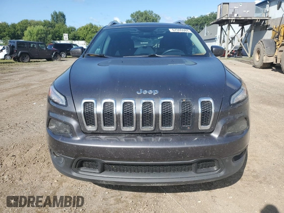 2015 Jeep Cherokee North with VIN 1C4PJMCSXFW582677, listed as a Copart auction lot 67999984 with 220,045 mi miles and Salvage Title. Bid and sale history available at carsss.com. Image 5.