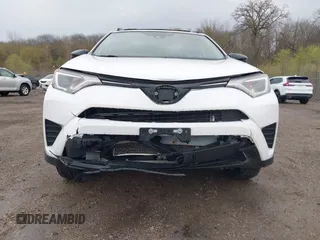 2018 Toyota RAV4 LE with VIN JTMBFREV8JJ722277, listed as a IAAI auction lot 42075684 with 203,458 mi miles and . Bid and sale history available at DreamBid. Image 6.