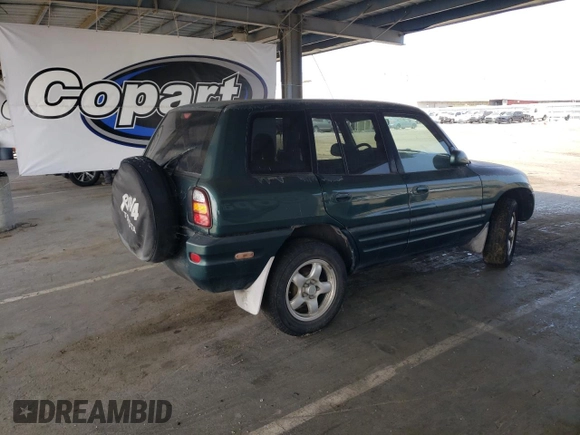 2000 Toyota RAV4 z VIN JT3GP10V6Y7072582, wystawiony jako Copart lot #60486825 z przebiegiem 182 699 mil mil oraz Szkoda całkowita • Salvage title. Historia ofert i sprzedaży dostępna na DreamBid. Obrazek 3.