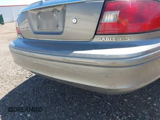 2002 Mercury Sable GS z VIN 1MEFM50U92G639145, wystawiony jako IAAI lot #42373493 z przebiegiem 193 318 mil mil oraz . Historia ofert i sprzedaży dostępna na DreamBid. Obrazek 15.