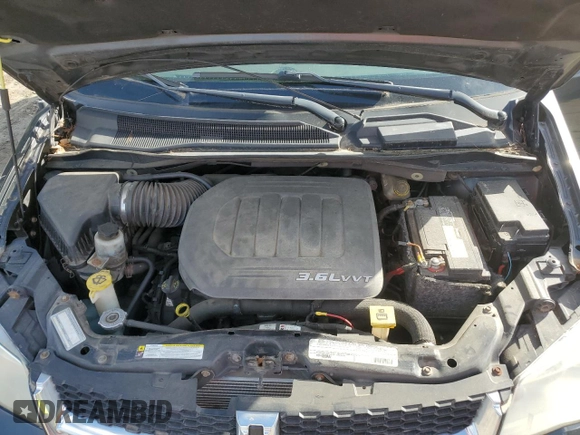 2012 Dodge Grand Caravan SXT with VIN 2C4RDGCG4CR179067, listed as a Copart auction lot 78976394 with 126,714 mi miles and Non Repairable. Bid and sale history available at DreamBid. Image 12.