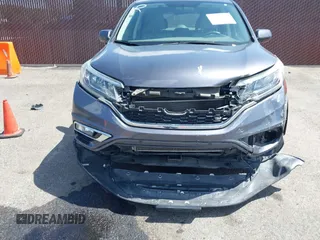 2015 Honda CR-V EX with VIN 3CZRM3H58FG711070, listed as a IAAI auction lot 41948788 with 140,130 mi miles and . Bid and sale history available at carsss.com. Image 12.
