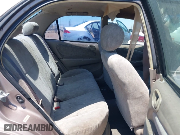 1998 Toyota Corolla VE with VIN 1NXBR18E8WZ105435, listed as a IAAI auction lot 42660562 with 295,050 mi miles and . Bid and sale history available at DreamBid. Image 8.