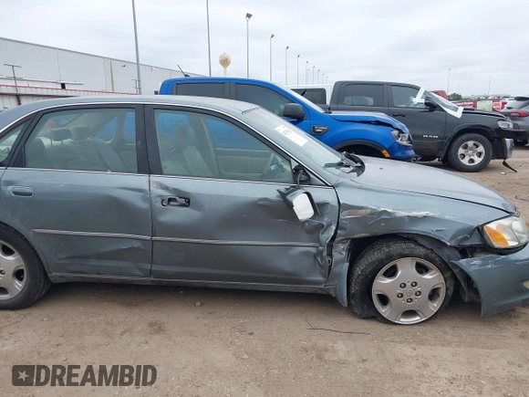 2004 Toyota Avalon XL with VIN 4T1BF28B84U370390, listed as a IAAI auction lot 41351151 with 242,910 mi miles and . Bid and sale history available at DreamBid. Image 6.