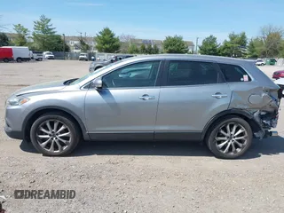 2014 Mazda CX-9 Grand Touring z VIN JM3TB3DV4E0429428, wystawiony jako IAAI lot #42094028 z przebiegiem 147 294 mil mil oraz . Historia ofert i sprzedaży dostępna na DreamBid. Obrazek 14.