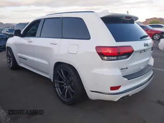 2018 Jeep Grand Cherokee Overland z VIN 1C4RJFCG7JC158464, wystawiony jako IAAI lot #42056386 z przebiegiem 94 608 mil mil oraz . Historia ofert i sprzedaży dostępna na DreamBid. Obrazek 3.