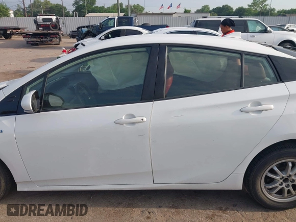 2019 Toyota Prius L Eco z VIN JTDKARFU8K3069783, wystawiony jako IAAI lot #42041554 z przebiegiem 107 363 mil mil oraz . Historia ofert i sprzedaży dostępna na DreamBid. Obrazek 14.