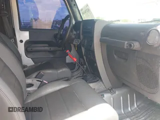 2009 Jeep Wrangler X with VIN 1J4FA24189L755392, listed as a IAAI auction lot 42176130 with 97,644 mi miles and . Bid and sale history available at DreamBid. Image 5.