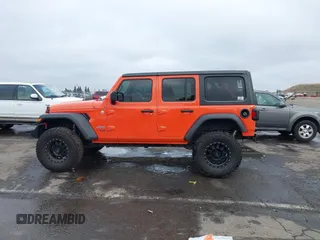 2019 Jeep Wrangler Unlimited Sport S with VIN 1C4HJXDG7KW568441, listed as a IAAI auction lot 41142271 with 73,698 mi miles and . Bid and sale history available at DreamBid. Image 15.