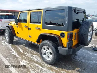 2013 Jeep Wrangler Unlimited Sport z VIN 1C4BJWDG6DL544197, wystawiony jako IAAI lot #41968556 z przebiegiem 121 101 mil mil oraz . Historia ofert i sprzedaży dostępna na DreamBid. Obrazek 3.