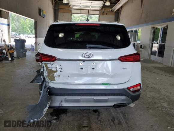 2019 Hyundai Santa Fe SE z VIN 5NMS2CAD4KH115371, wystawiony jako Copart lot #59180895 z przebiegiem 127 444 mil mil oraz Szkoda całkowita • Salvage title. Historia ofert i sprzedaży dostępna na DreamBid. Obrazek 6.