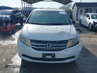 2011 Honda Odyssey EX-L with VIN 5FNRL5H6XBB059162, listed as a IAAI auction lot 42061378 with 164,317 mi miles and . Bid and sale history available at carsss.com. Image 12.