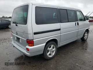 2003 Volkswagen EuroVan с VIN WV2KB47093H041606, выставлен на аукционе Copart как лот 73808224 с пробегом 228 496 миль миль и Чистый • Clean title. История ставок и продаж доступна на DreamBid. Изображение 3.