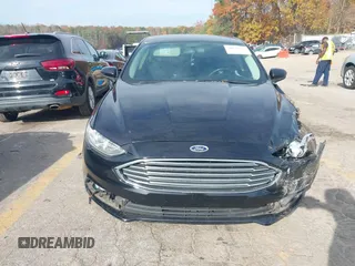 2018 Ford Fusion SE with VIN 3FA6P0HDXJR157605, listed as a IAAI auction lot 40979897 with 128,322 mi miles. Bid and sale history available at carsss.com. Image 11.