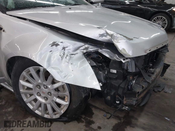 2012 Cadillac CTS with VIN 1G6DC5E59C0135916, listed as a IAAI auction lot 41504182 with 53,000 mi miles and . Bid and sale history available at DreamBid. Image 6.