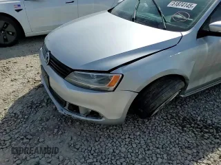 2012 Volkswagen Jetta TDI w/Premium с VIN 3VWLL7AJ7CM388380, выставлен на аукционе Copart как лот 51874145 с пробегом 128 270 миль миль и Списание • Salvage title. История ставок и продаж доступна на DreamBid. Изображение 11.