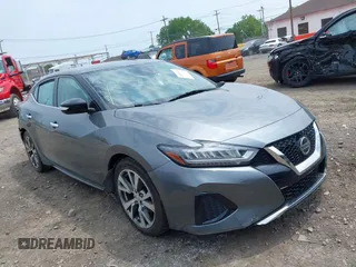 2020 Nissan Maxima SV z VIN 1N4AA6CV4LC374065, wystawiony jako IAAI lot #42491620 z przebiegiem 97 415 mil mil oraz . Historia ofert i sprzedaży dostępna na DreamBid. Obrazek 1.