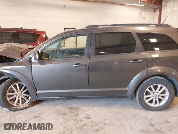 2017 Dodge Journey SXT z VIN 3C4PDCBGXHT534121, wystawiony jako IAAI lot #42145689 z przebiegiem 201 527 mil mil oraz . Historia ofert i sprzedaży dostępna na DreamBid. Obrazek 14.