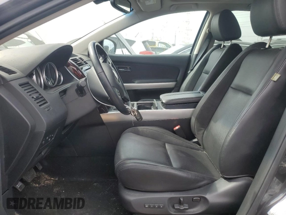 2015 Mazda CX-9 Grand Touring z VIN JM3TB3DA6F0460842, wystawiony jako Copart lot #52630325 z przebiegiem 21 666 mil mil oraz Szkoda całkowita • Salvage title. Historia ofert i sprzedaży dostępna na DreamBid. Obrazek 7.