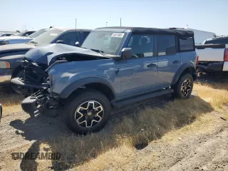 2023 Ford Bronco z VIN 1FMDE5BHXPLA99837, wystawiony jako Copart lot #56073885 z przebiegiem 9 679 mil mil oraz Szkoda całkowita • Salvage title. Historia ofert i sprzedaży dostępna na DreamBid. Obrazek 1.