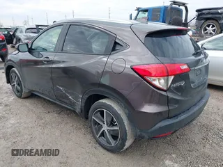 2021 Honda HR-V EX with VIN 3CZRU6H59MM720845, listed as a IAAI auction lot 41461037 with 32,716 mi miles. Bid and sale history available at carsss.com. Image 3.