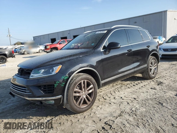 2016 Volkswagen Touareg Sport with VIN WVGEF9BP7GD010767, listed as a Copart auction lot 44782585 with 125,970 mi miles and Salvage Title. Bid and sale history available at DreamBid. Image 1.
