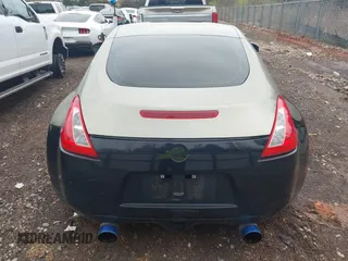 2009 Nissan 370Z Touring with VIN JN1AZ44E69M404341, listed as a IAAI auction lot 41907551 with 144,612 mi miles and . Bid and sale history available at DreamBid. Image 16.