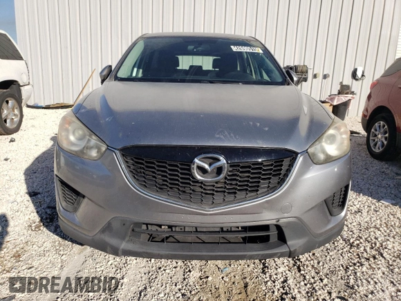 2014 Mazda CX-5 Sport with VIN JM3KE2BE1E0332932, listed as a Copart auction lot 42690515 with 93,420 mi miles and Clean Title. Bid and sale history available at carsss.com. Image 5.