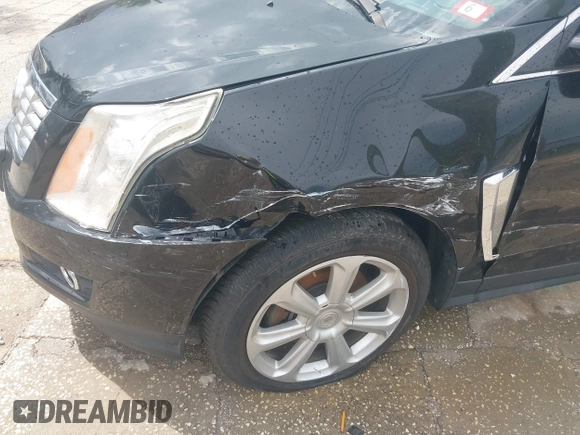 2015 Cadillac SRX Premium Collection with VIN 3GYFNGE30FS634363, listed as a IAAI auction lot 42672064 with 146,821 mi miles and . Bid and sale history available at DreamBid. Image 6.