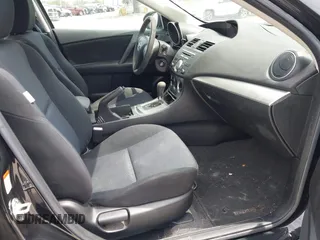 2011 Mazda Mazda3 i Touring with VIN JM1BL1VFXB1472772, listed as a IAAI auction lot 42180030 with 128,438 mi miles. Bid and sale history available at carsss.com. Image 5.