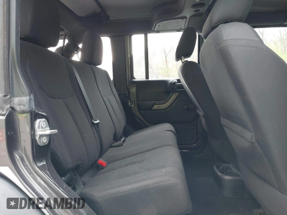 2018 Jeep Wrangler JK Unlimited Sport S with VIN 1C4BJWDG8JL895981, listed as a IAAI auction lot 42048316 with 95,457 mi miles. Bid and sale history available at carsss.com. Image 8.