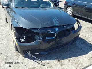 2014 BMW 3 Series 328i with VIN WBA3A5C55EP603035, listed as a IAAI auction lot 41771067 with 105,162 mi miles and . Bid and sale history available at carsss.com. Image 6.