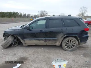 2019 Jeep Grand Cherokee Laredo E with VIN 1C4RJFAGXKC674676, listed as a IAAI auction lot 41942125 with 72,151 mi miles. Bid and sale history available at carsss.com. Image 15.