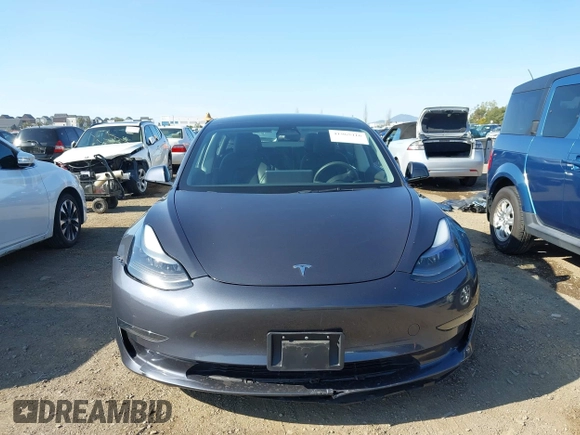 2023 Tesla Model 3 with VIN 5YJ3E1EA7PF447409, listed as a IAAI auction lot 41965416 with 40,033 mi miles and . Bid and sale history available at DreamBid. Image 12.