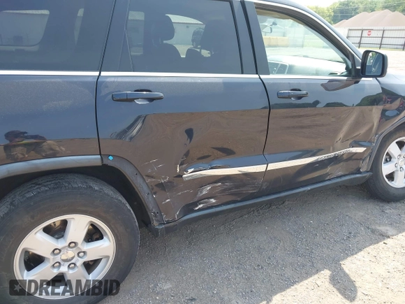 2011 Jeep Grand Cherokee Laredo with VIN 1J4RR4GG2BC550934, listed as a IAAI auction lot 42467947 with 198,904 mi miles and . Bid and sale history available at DreamBid. Image 6.